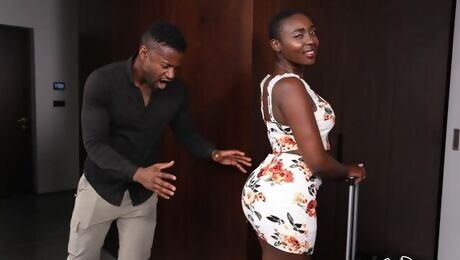 Almost bald busty ebony Zaawaadi jumps on a hard brown penis